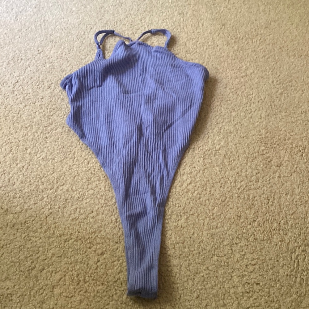 High cut body suit with adjustable straps